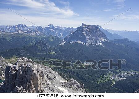 Stock Photo - View of mountains and valley, Alleghe, Dolomites, Italy. Fotosearch