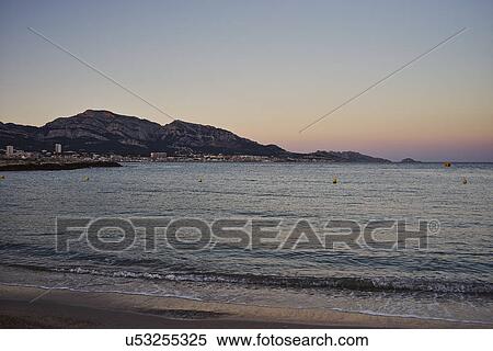 View of sea at sunset, Marseille, France View Large Photo Image Stock Photography - View of sea at sunset, Marseille, France. Fotosearch