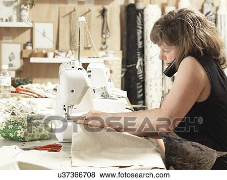 Women sewing in hand-printing textile workshop View Large Photo Image Stock Photo - Women sewing in hand-printing textile workshop. Fotosearch