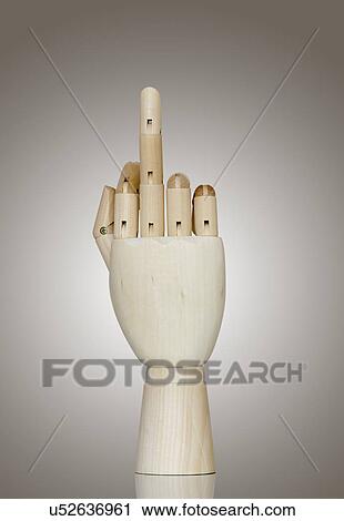 Wooden hand making rude gesture with middle finger View Large Photo Image Stock Image - Wooden hand making rude gesture with middle finger. Fotosearch