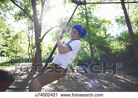 Young boy in fancy dress, on zip wire View Large Photo Image Stock Image - Young boy in fancy dress, on zip wire. Fotosearch