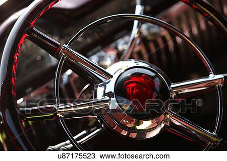 Stock Image - Close up of a steering wheel. Fotosearch