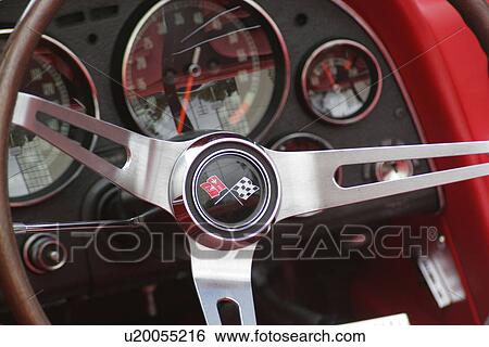 Corvette logo on a steering wheel View Large Photo Image Stock Photograph - Corvette logo on a steering wheel . Fotosearch
