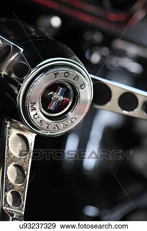 Stock Photo - Ford mustang logo and steering wheel. Fotosearch