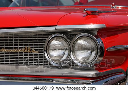 Stock Photo - Front of red classic car. Fotosearch