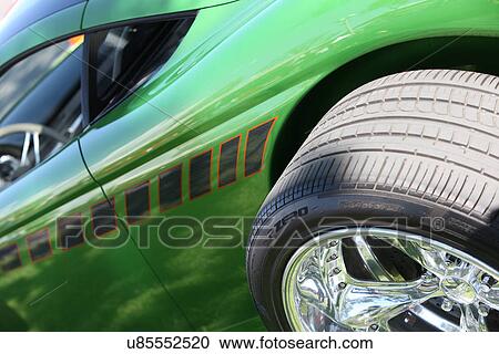 Stock Image - Green muscle car. Fotosearch