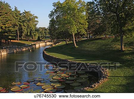 Stock Image - River in a park . Fotosearch