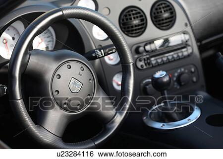 Sports car steering wheel View Large Photo Image Stock Photograph - Sports car steering wheel. Fotosearch