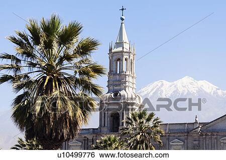 Stock Photograph - Basilica Cathedral of Arequipa and El Misti Volcano. Fotosearch
