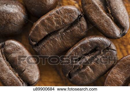 Close up of roasted coffee beans View Large Photo Image Picture - Close up of roasted coffee beans. Fotosearch