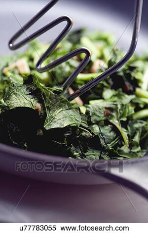 Stock Photography - Close-up of sauteed lettuce. Fotosearch