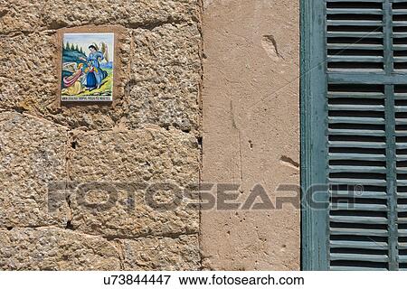 Close up of tile with angels on wall View Large Photo Image Stock Photo - Close up of tile with angels on wall. Fotosearch