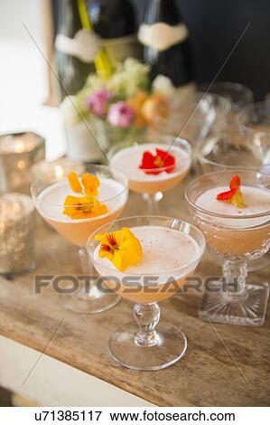 Cocktails on table View Large Photo Image Stock Photo - Cocktails on table. Fotosearch