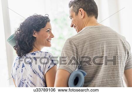 Stock Photograph - Couple in gym. Fotosearch