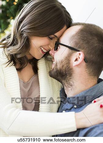 Couple rubbing noses View Large Photo Image Stock Image - Couple rubbing noses. Fotosearch