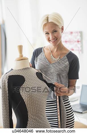 Designer creating dress View Large Photo Image Stock Photograph - Designer creating dress. Fotosearch