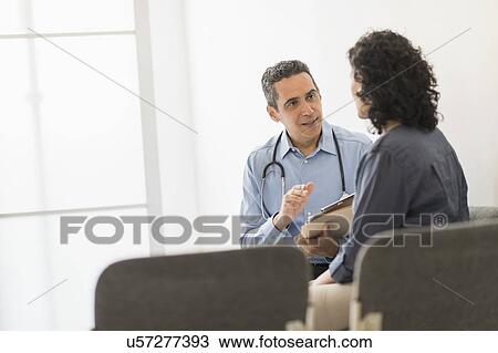 Doctor talking to patient View Large Photo Image Stock Image - Doctor talking to patient. Fotosearch
