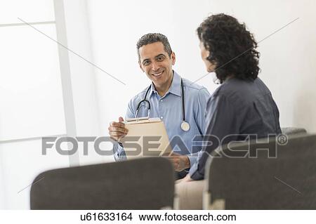 Picture - Doctor with patient. Fotosearch