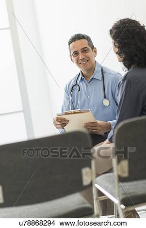 Picture - Doctor with patient. Fotosearch