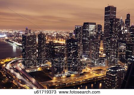 Elevated view of Lake Shore Drive and Chicago architecture at sunset View Large Photo Image Stock Image - Elevated view of Lake Shore Drive and Chicago architecture at sunset . Fotosearch