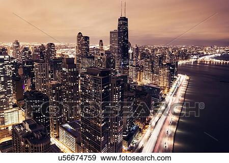 Elevated view of Lake Shore Drive and Chicago architecture at sunset View Large Photo Image Stock Photo - Elevated view of Lake Shore Drive and Chicago architecture at sunset . Fotosearch