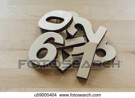 Picture - Heap of wooden numbers. Fotosearch