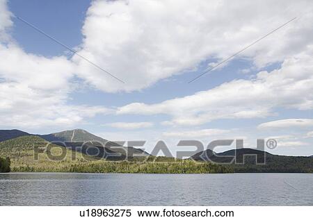 Stock Photography - Lake Placid and mountains. Fotosearch