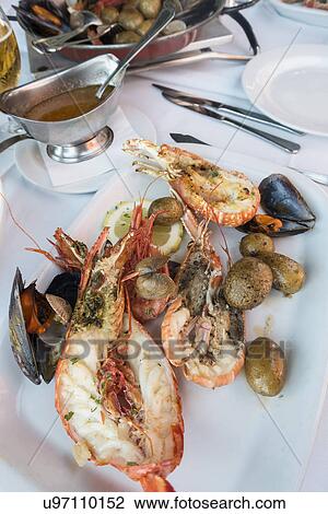Langoustine with mussels and green olives View Large Photo Image Stock Image - Langoustine with mussels and green olives. Fotosearch