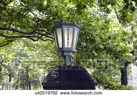 Lantern with subway sign View Large Photo Image Stock Image - Lantern with subway sign. Fotosearch