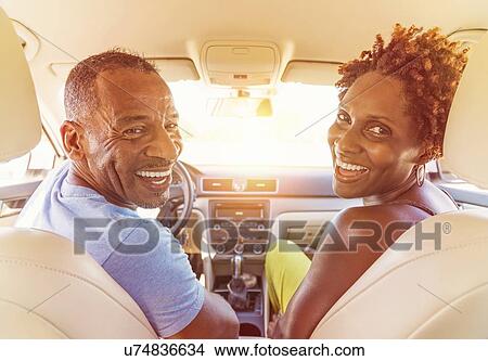 Picture - Mature couple in car. Fotosearch