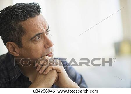 Stock Photography - Mature man thinking. Fotosearch
