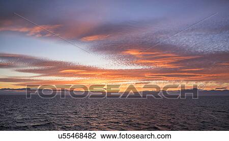 Stock Image - Mediterranean Sea at sunset. Fotosearch