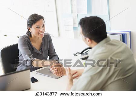 Stock Photo - Meeting in office. Fotosearch