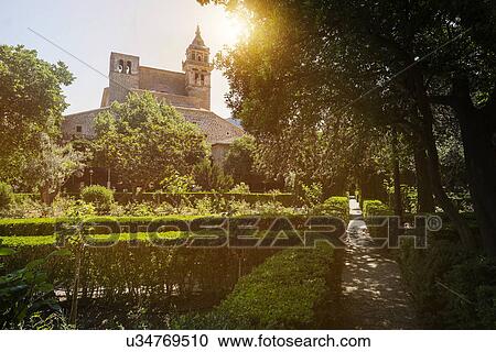 Stock Image - Monastery in garden. Fotosearch