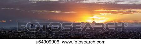 Panoramic view of city at sunrise View Large Photo Image Stock Photograph - Panoramic view of city at sunrise. Fotosearch