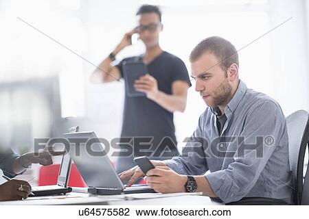 People working in office View Large Photo Image Stock Image - People working in office. Fotosearch