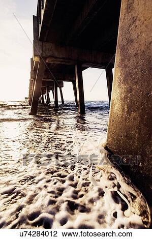 Stock Image - Pier at dusk. Fotosearch