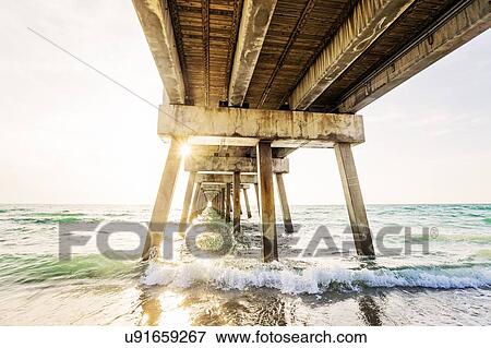 Stock Photo - Pier in sunlight. Fotosearch