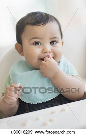 Portrait of baby boy (6-11 months) View Large Photo Image Stock Photo - Portrait of baby boy (6-11 months). Fotosearch