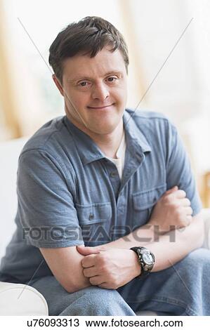 Portrait of man with down syndrome View Large Photo Image Stock Image - Portrait of man with down syndrome. Fotosearch