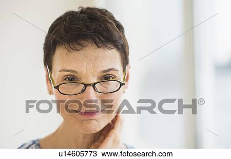 Stock Image - Portrait of senior woman. Fotosearch