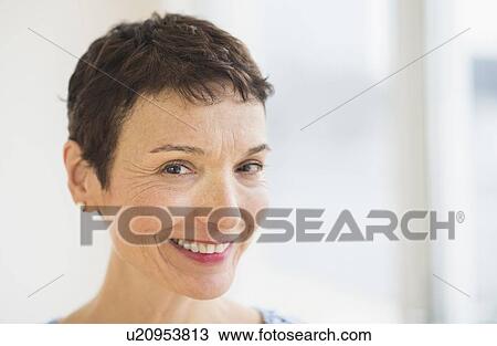 Stock Image - Portrait of senior woman. Fotosearch