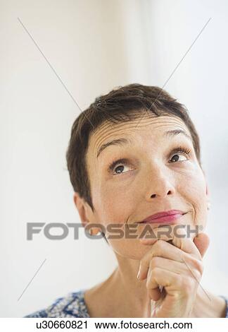 Stock Image - Portrait of senior woman. Fotosearch