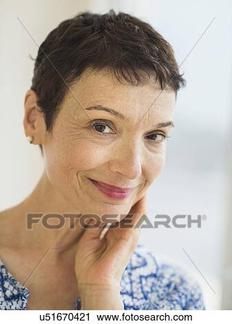 Stock Image - Portrait of senior woman. Fotosearch
