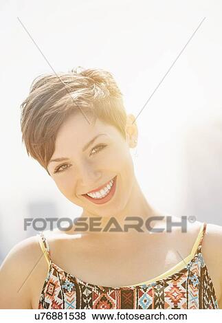 Portrait of smiling brunette View Large Photo Image Stock Photo - Portrait of smiling brunette. Fotosearch