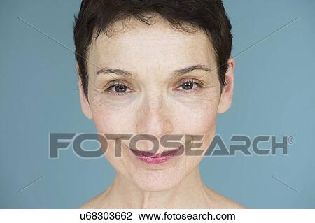 Portrait of smiling senior woman View Large Photo Image Stock Image - Portrait of smiling senior woman. Fotosearch