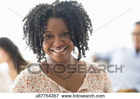Portrait of smiling woman View Large Photo Image Stock Photo - Portrait of smiling woman. Fotosearch