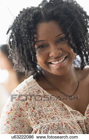 Portrait of smiling woman View Large Photo Image Stock Photograph - Portrait of smiling woman. Fotosearch