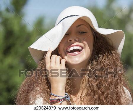 Portrait of woman wearing hat View Large Photo Image Stock Photo - Portrait of woman wearing hat. Fotosearch