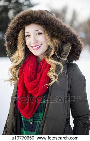Portrait of woman wearing red scarf smiling outdoors View Large Photo Image Stock Image - Portrait of woman wearing red scarf smiling outdoors. Fotosearch